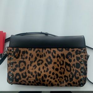 New calfskin Carolina Herrera clutch with beading.